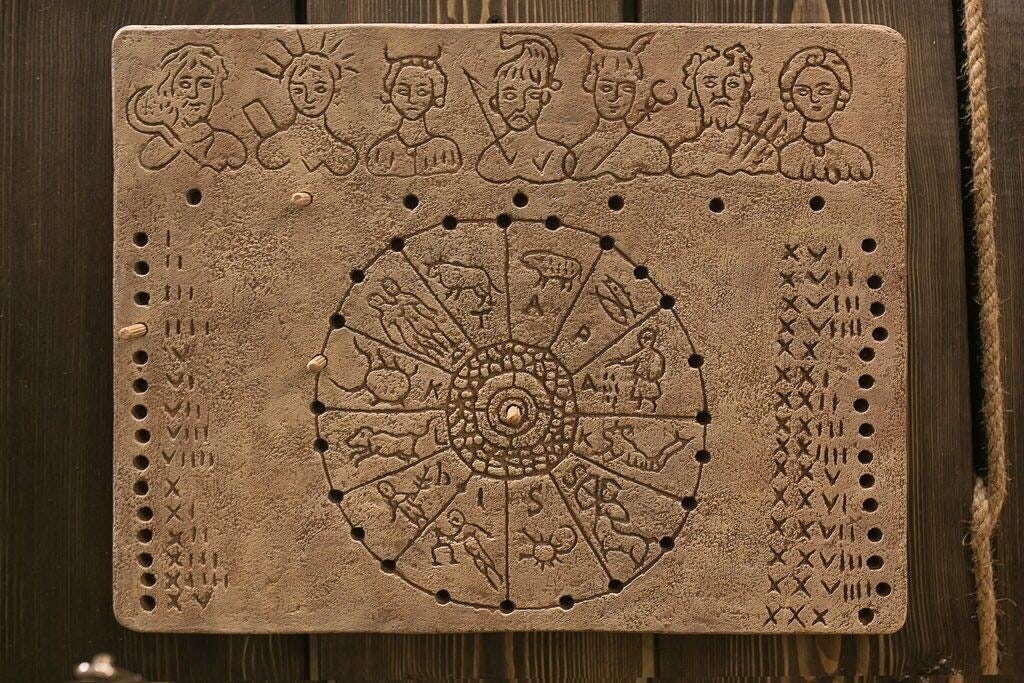 Ancient Roman calendar or stone carving style image